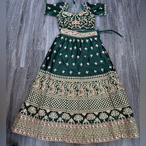 Green lehenga choli with gold embroidery and light green dupatta